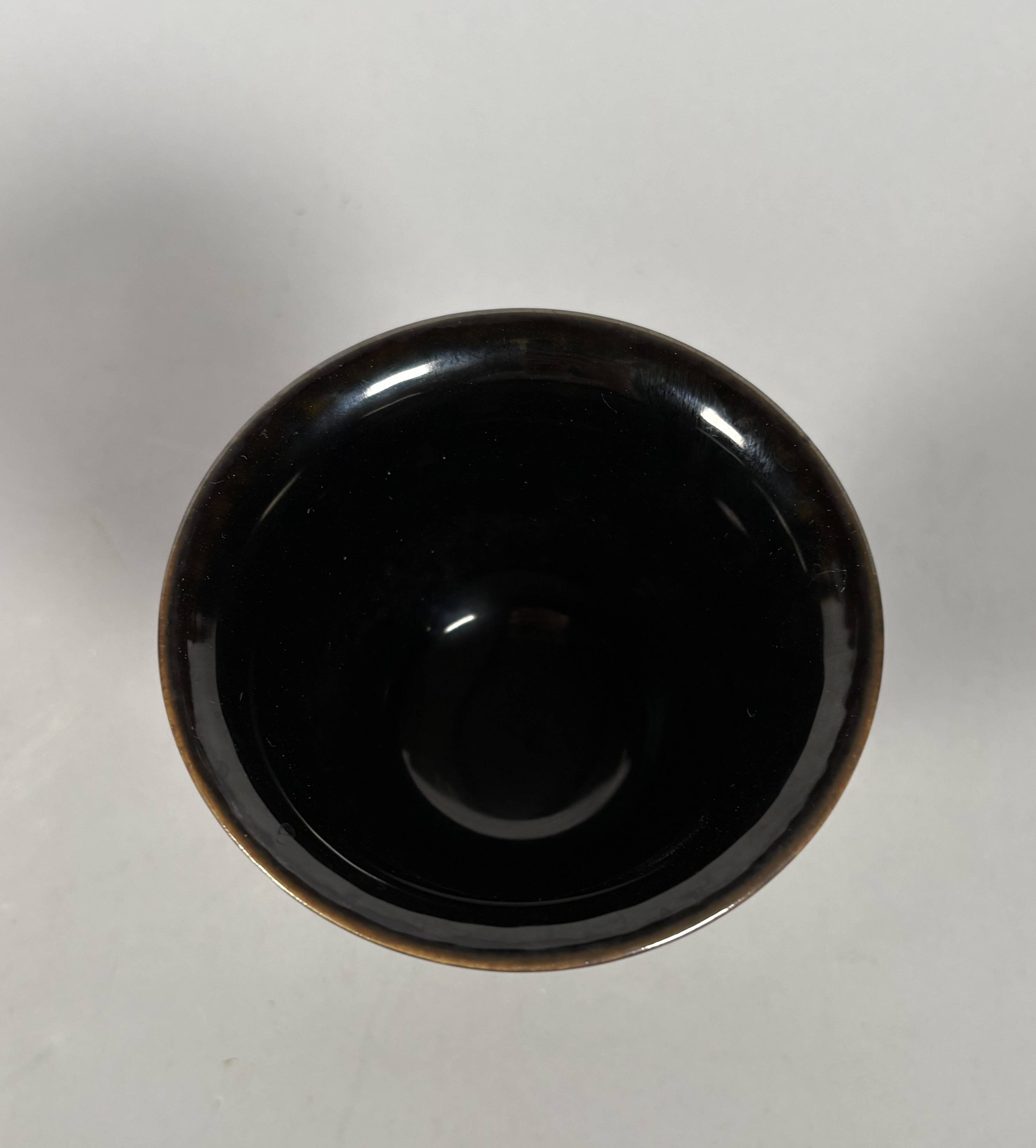 Monochrome black porcelain footed cup, 18th century China.