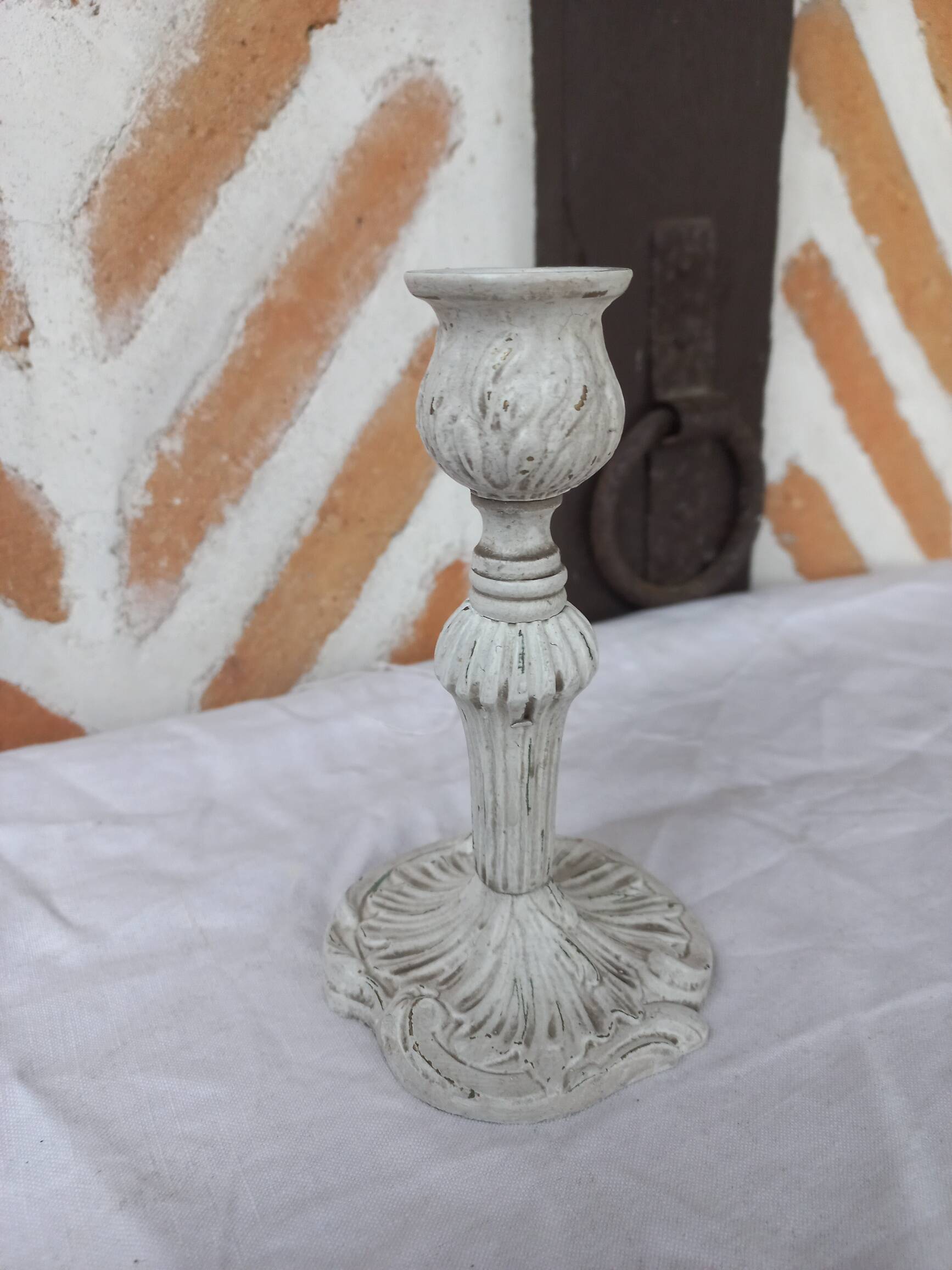 Candlestick holder patinated white gray