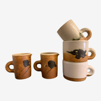 2 cups, 1 mug and 2 pourers in glazed ceramic, Poterie de la Colombe, 1970