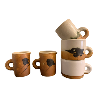 2 cups, 1 mug and 2 pourers in glazed ceramic, Poterie de la Colombe, 1970