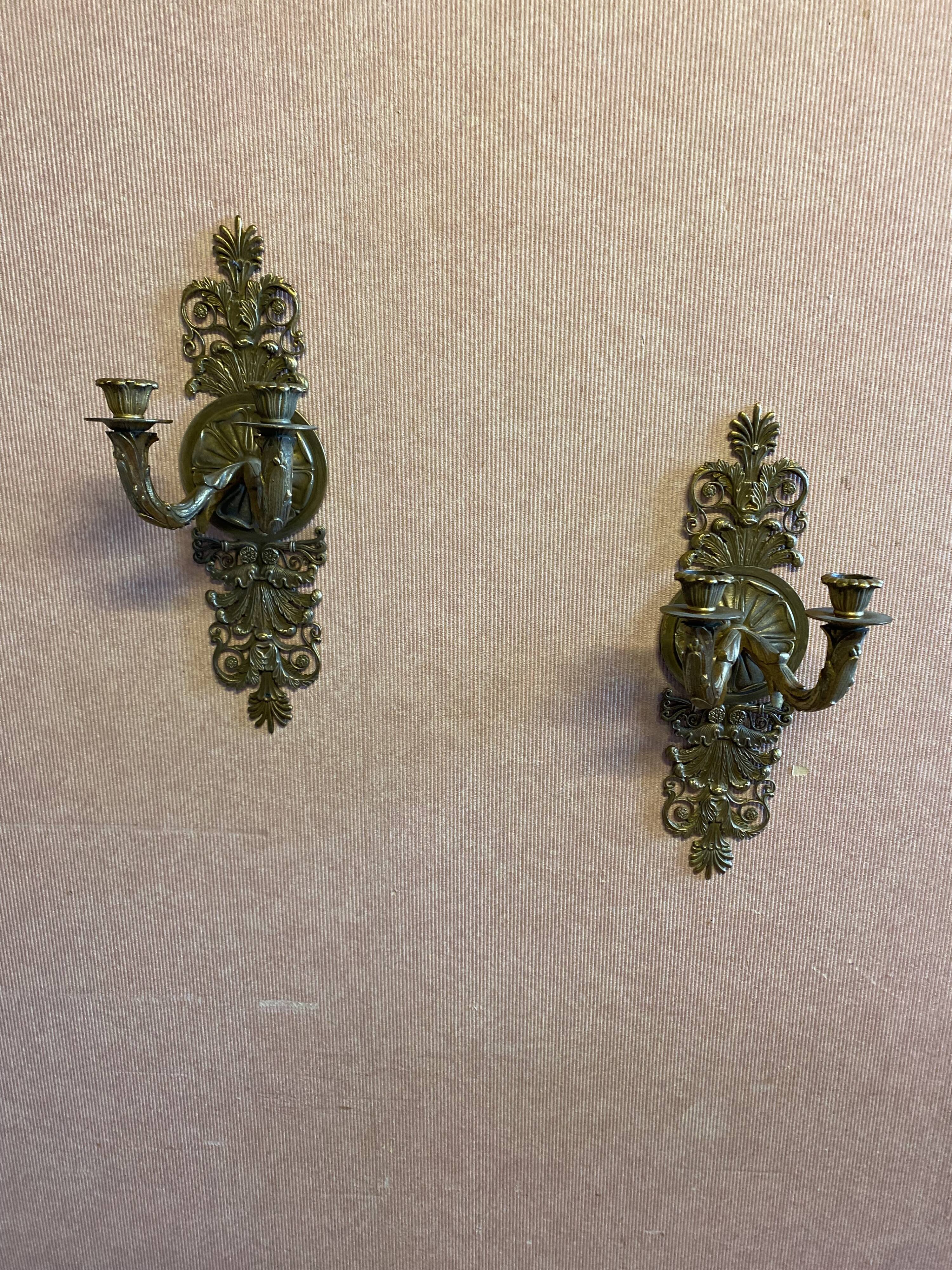 Pair of gilded bronze sconces, 2 burners, Restoration style.