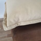 Fauteuil avec pouf en cuir et daim