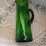Old green pitcher