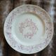 13 mismatched flat plates in ironstone