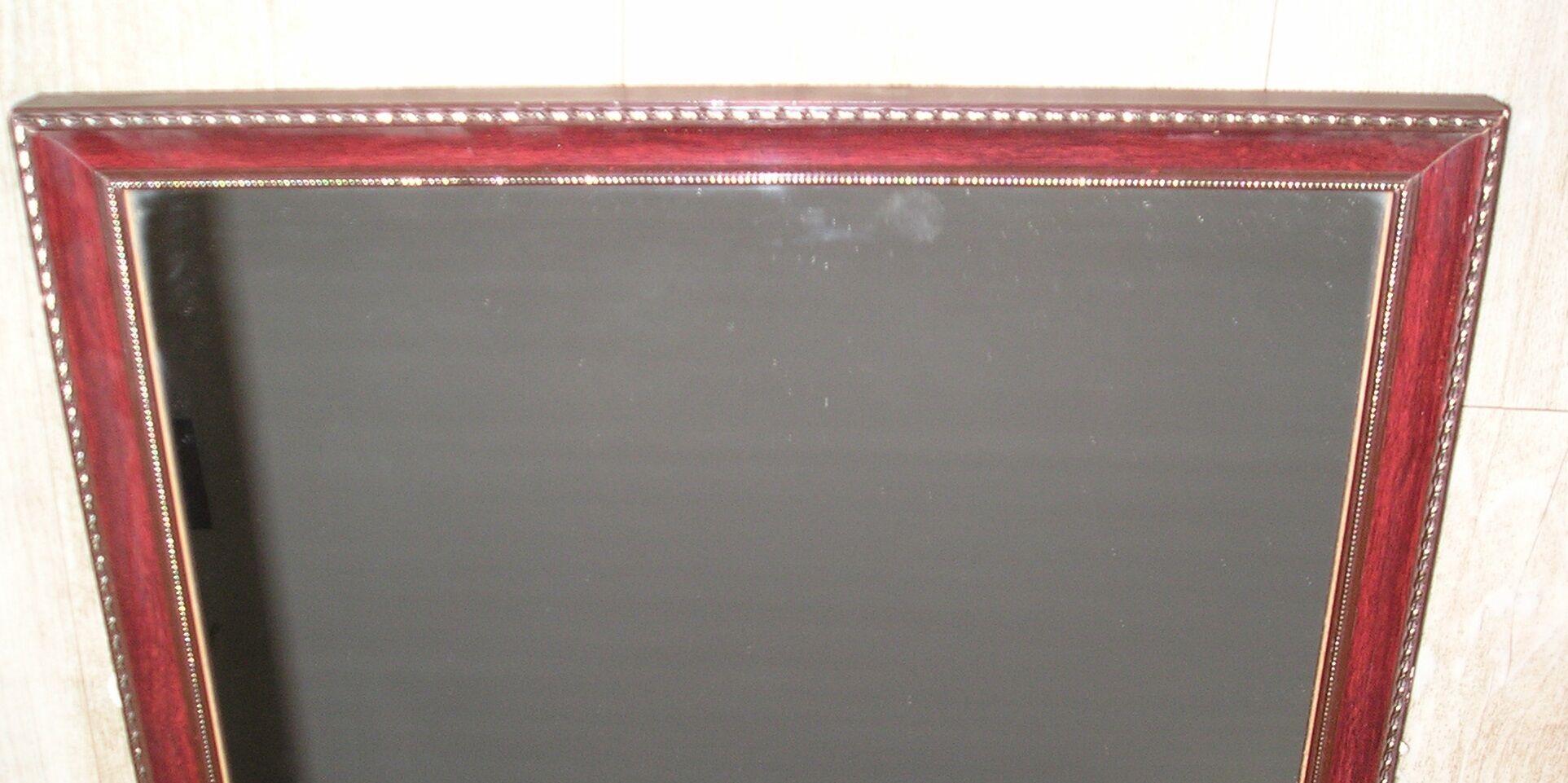 Contemporary wooden mirror enhanced with 2 brass frames 45x54cm