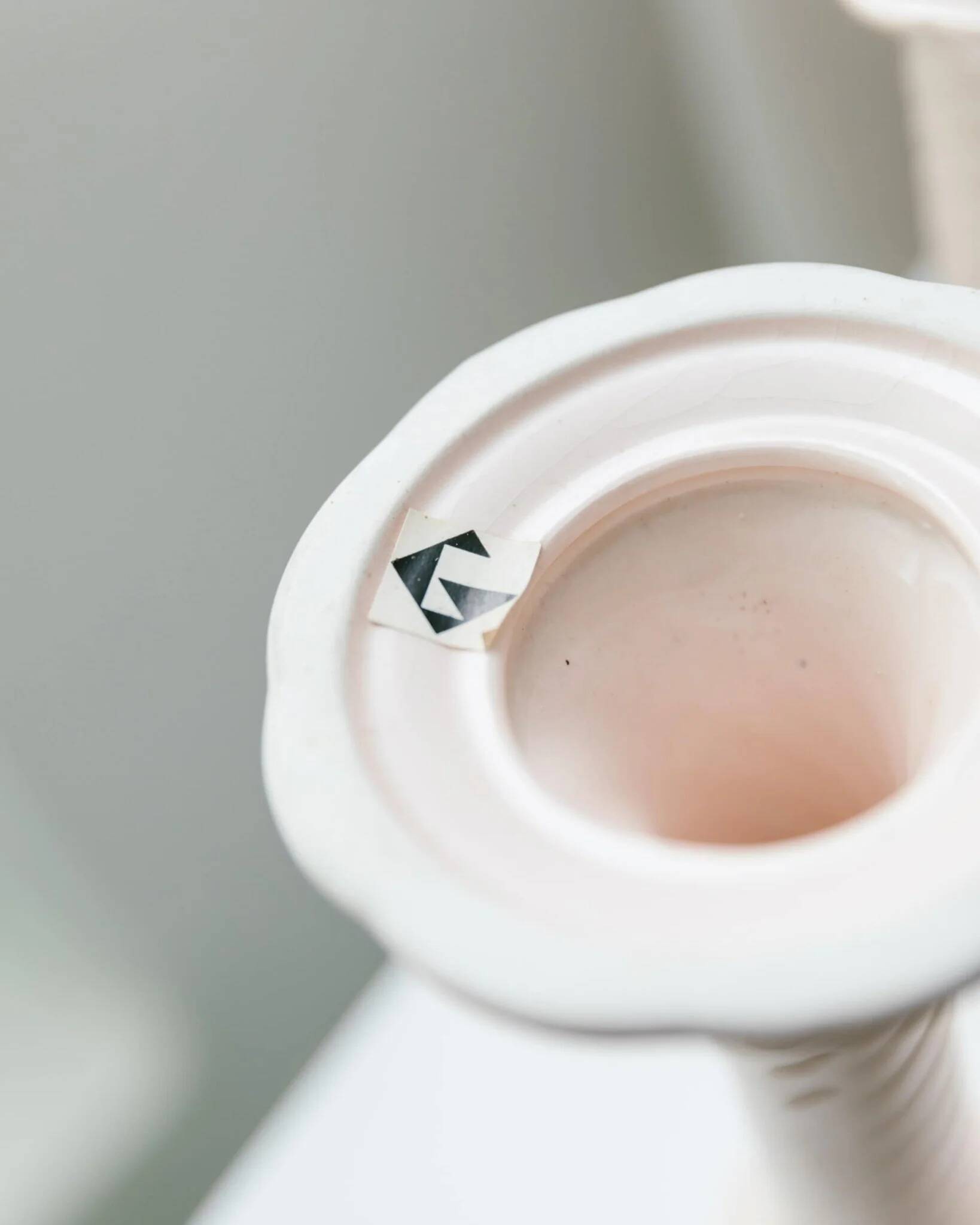 Cream ceramic mid-century set: two candle holders and a vase with white glaze, 1970s design