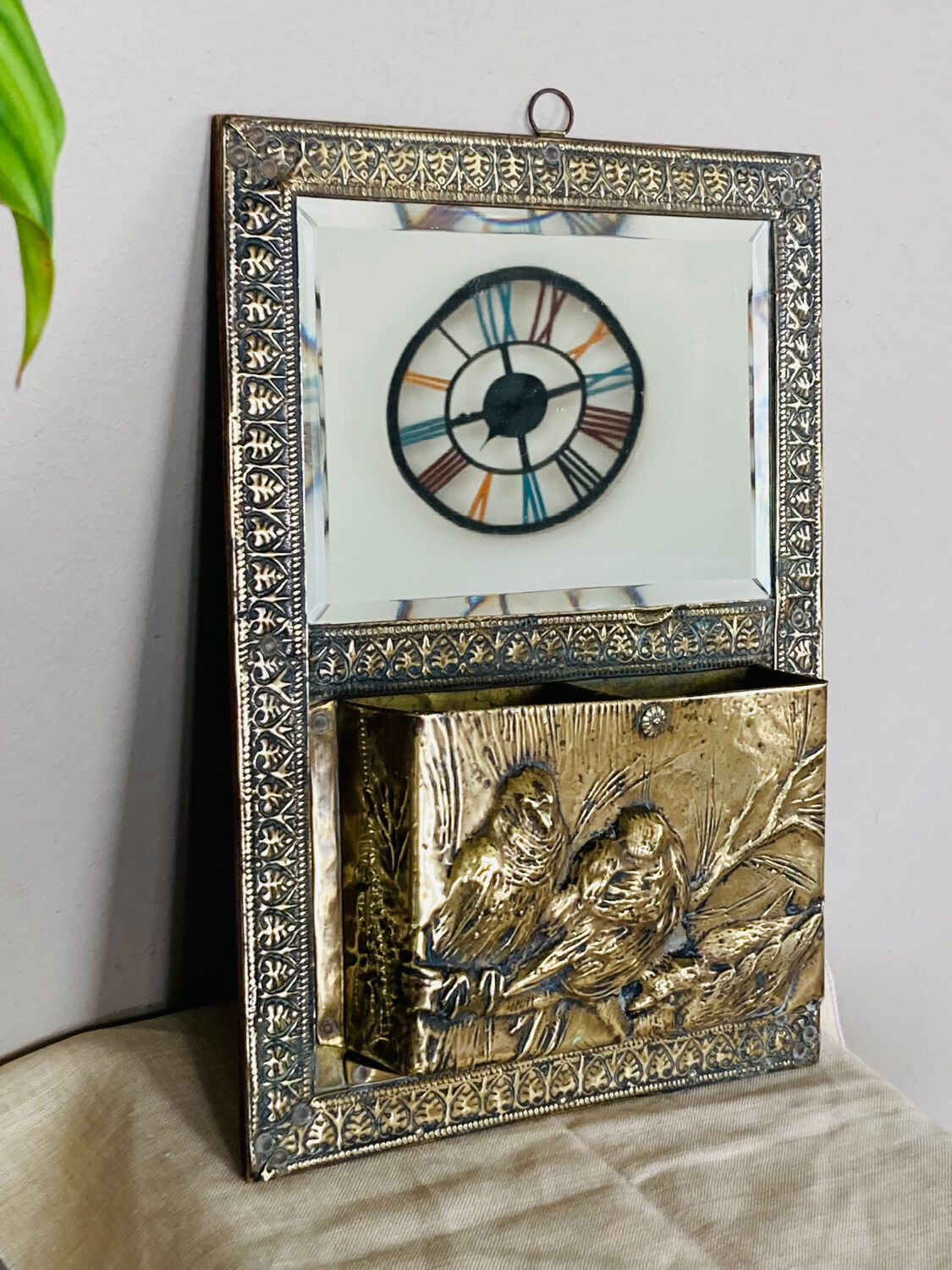 Art Nouveau mail rack in brass repelled beveled mirror early twentieth century