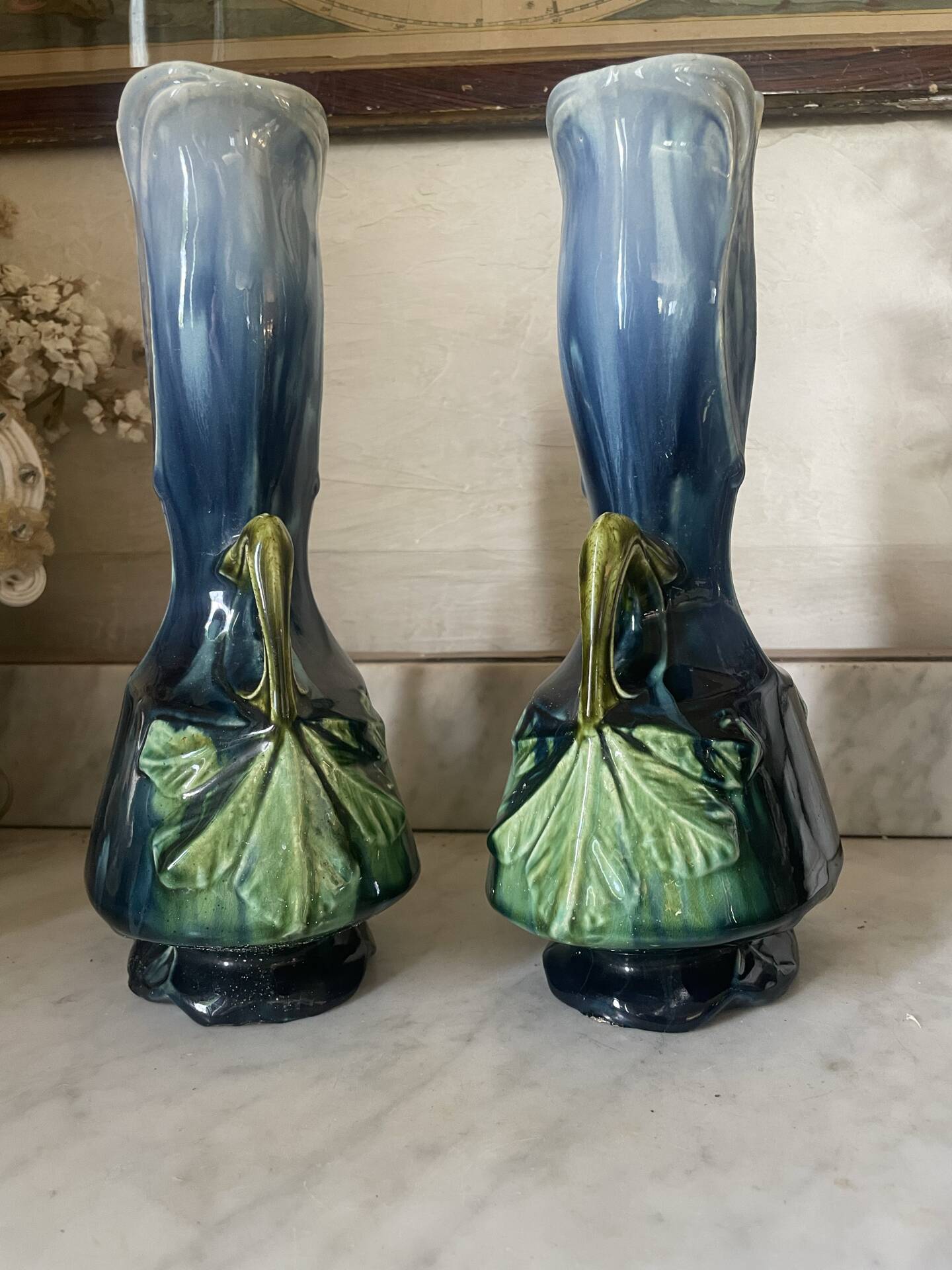 Pair of vases in slipware with Art Nouveau floral decoration.
