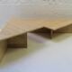 Pair de tables triangulaires en travertin