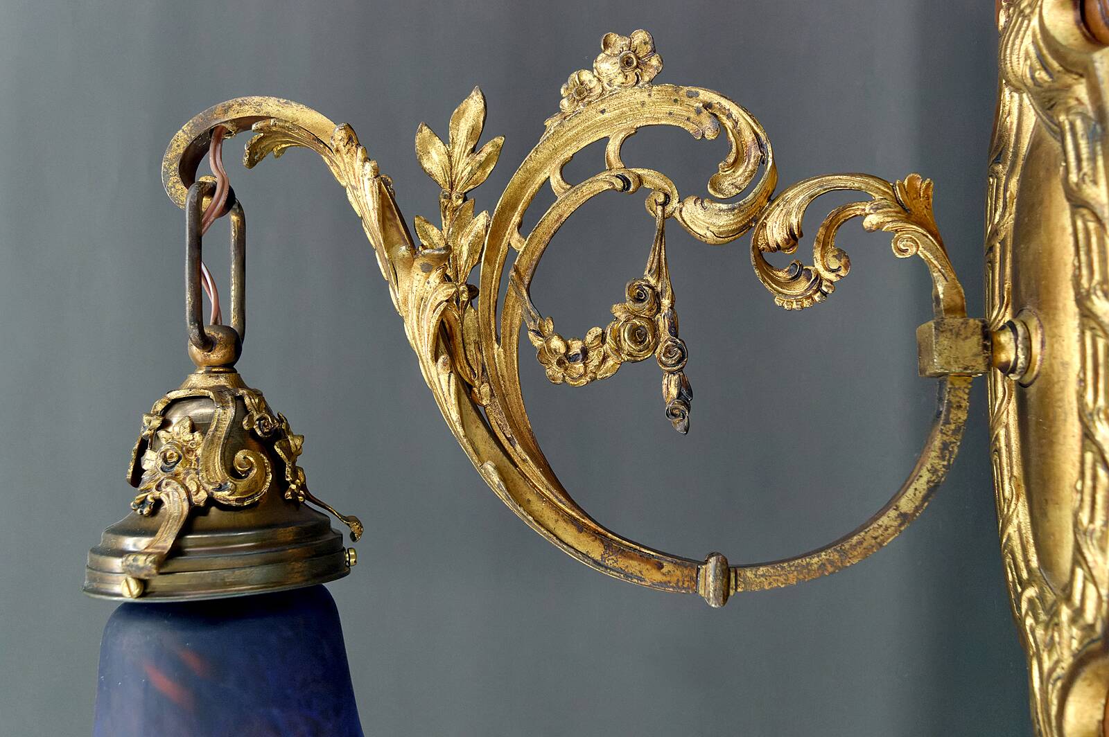 Pair of Rococo / Louis XV wall lights in gilded bronze, walnut bases and glass tulips, France, Circ