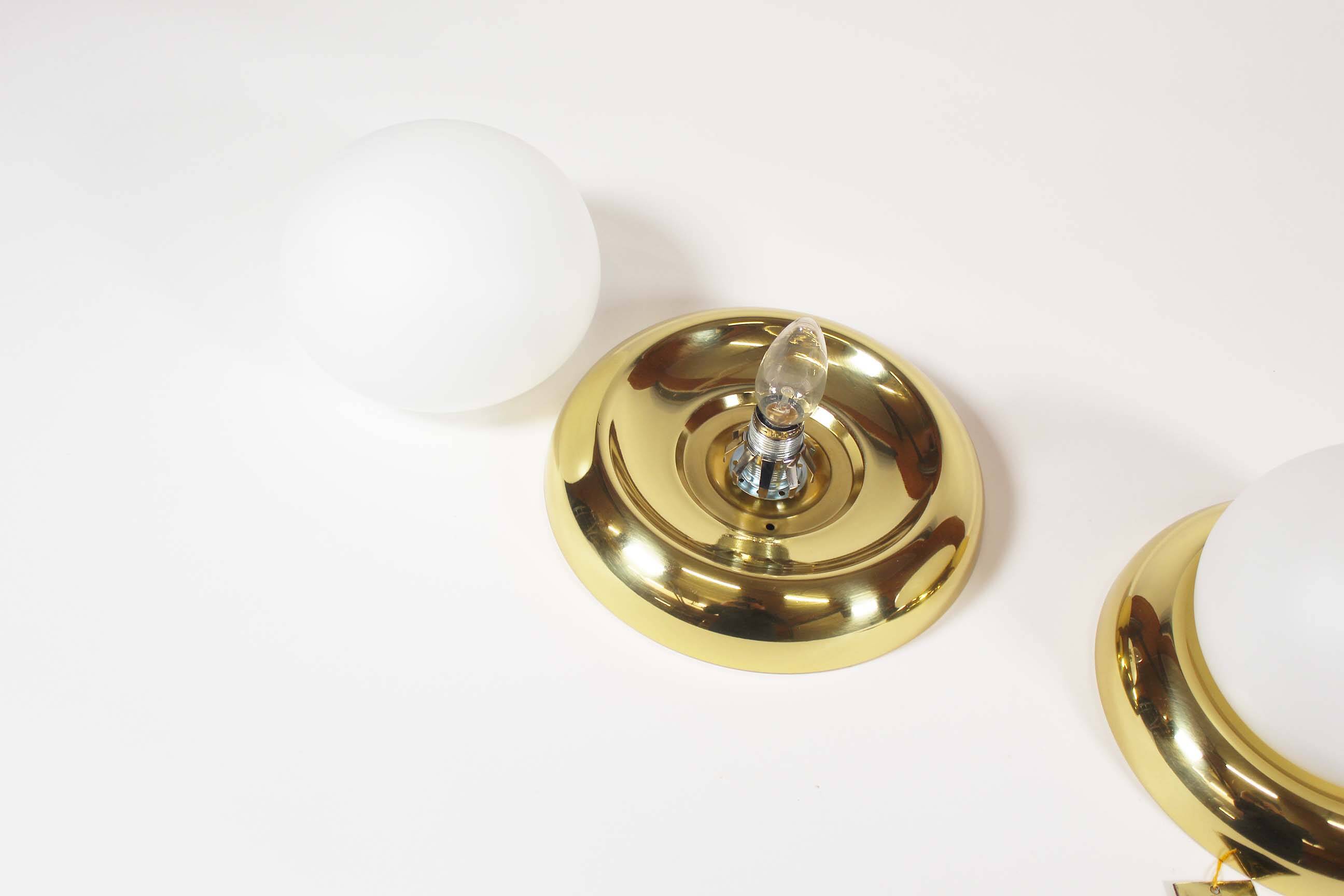 Pair of opaline glass and brass vintage wall lights by Kaiser