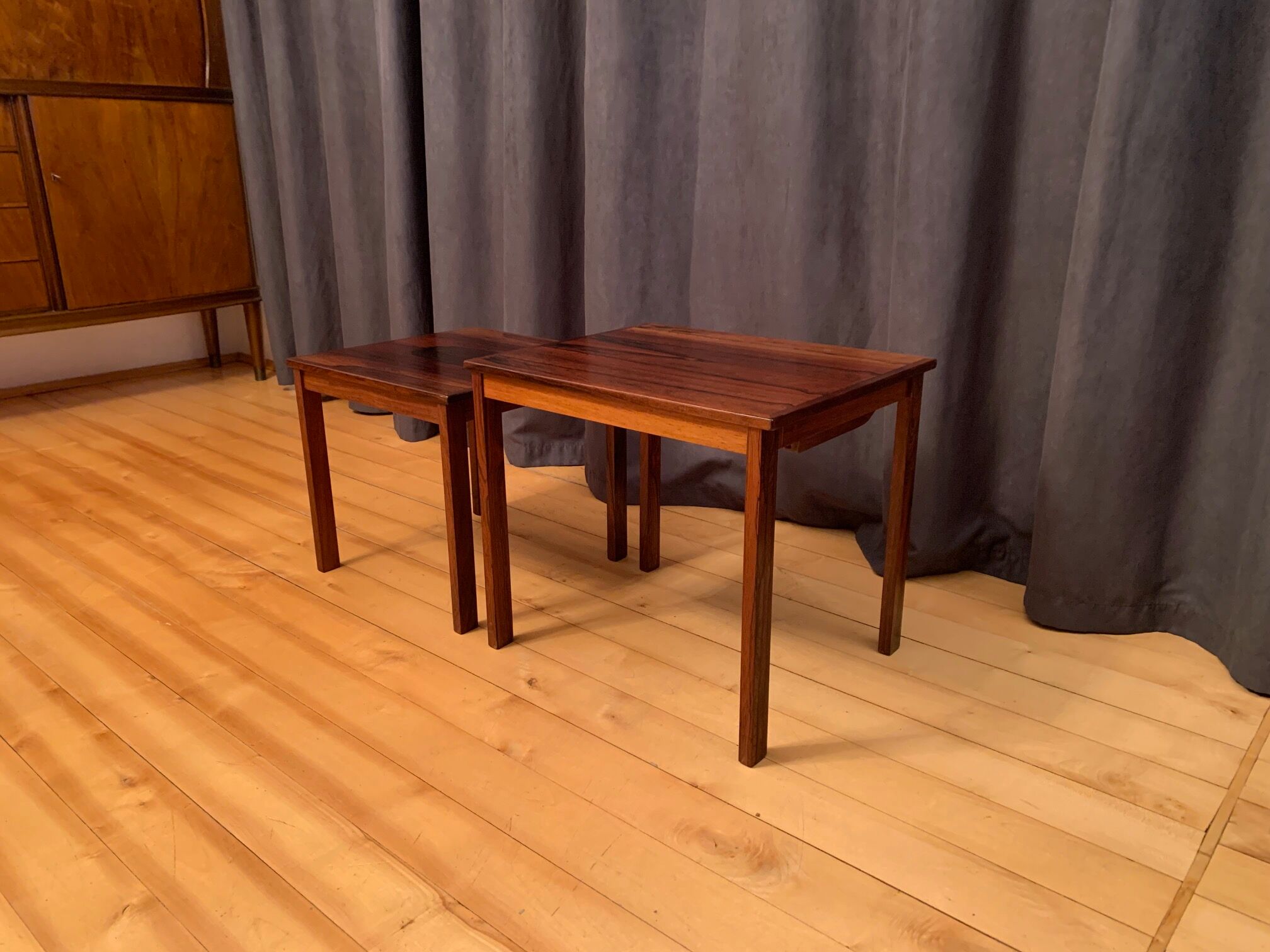 A pair of Kvalitet Form Funktion rosewood side tables Denmark 1960s
