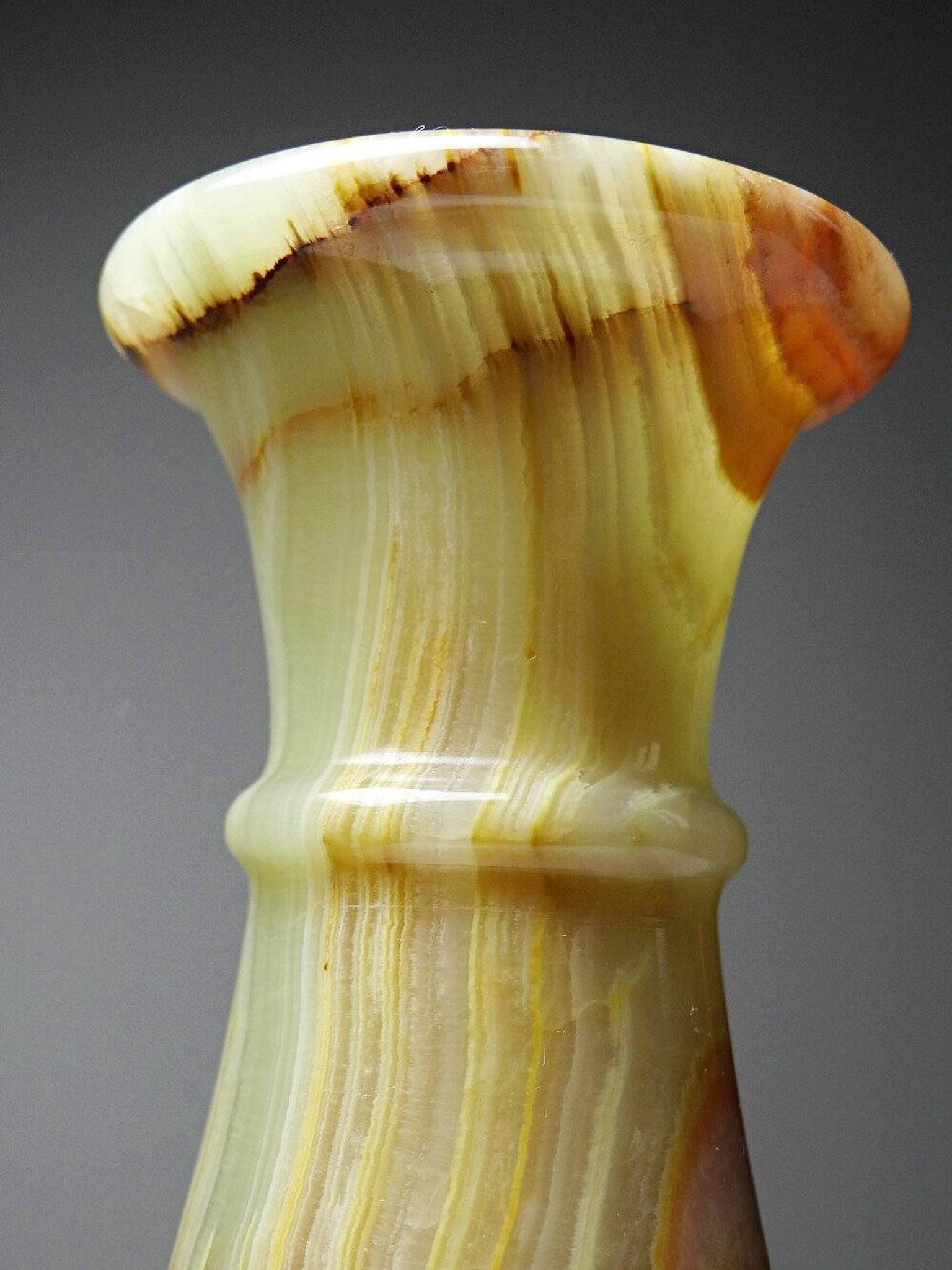 Small vintage baluster vase in green striped onyx, Italy, mid-century.