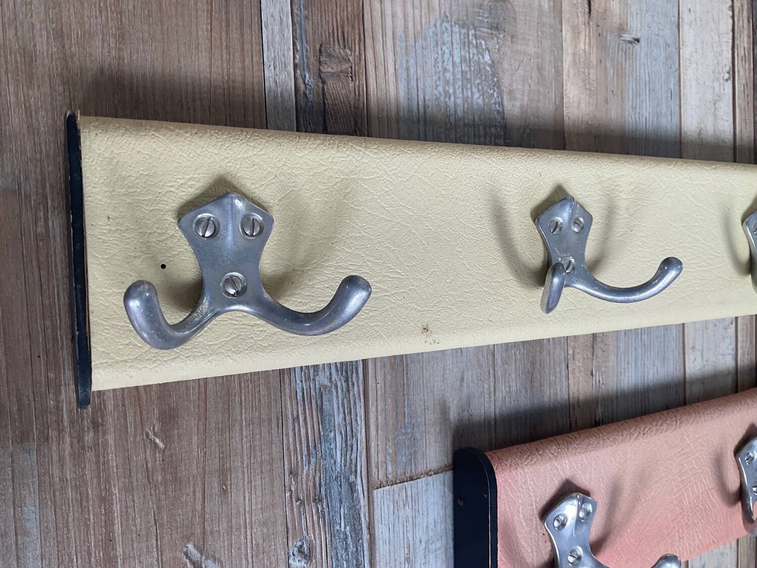 Duo of vintage coat racks from the 50s