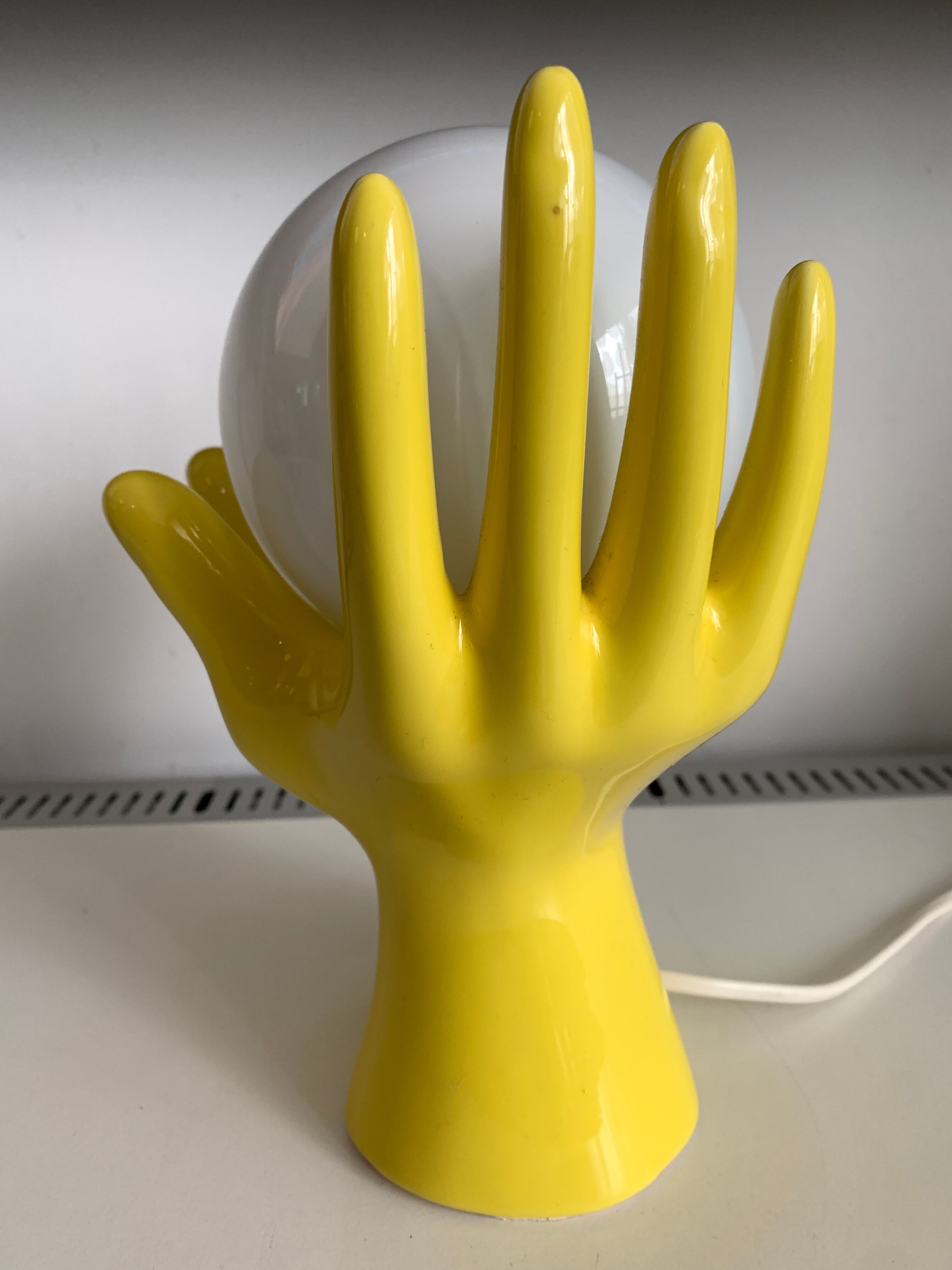 Yellow ceramic hand lamp
