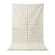 Ecru Moroccan rug with black dots.