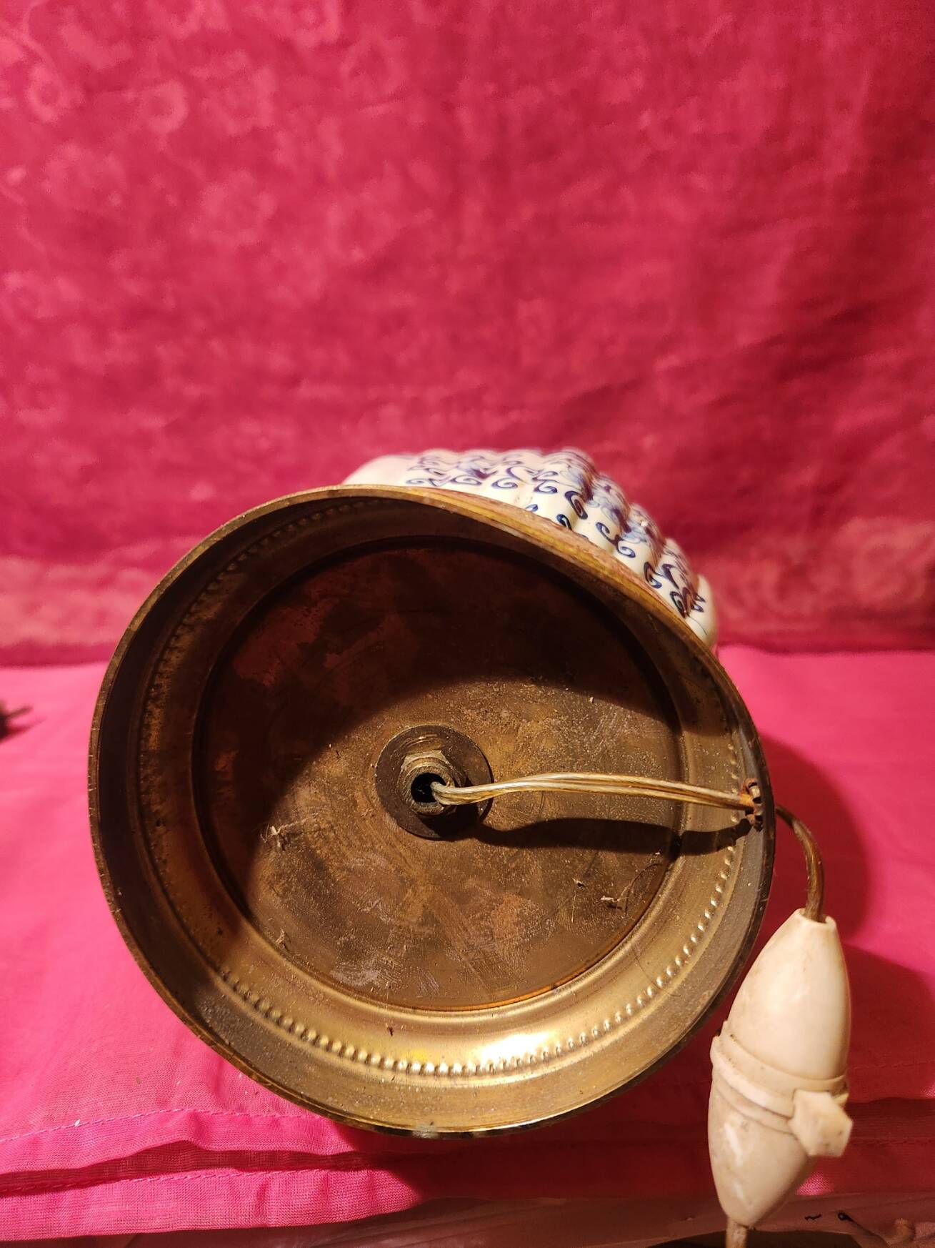 Antique ceramic lamp with brass or bronze base from the attic