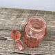 Art Deco perfume bottle in old amber pink glass