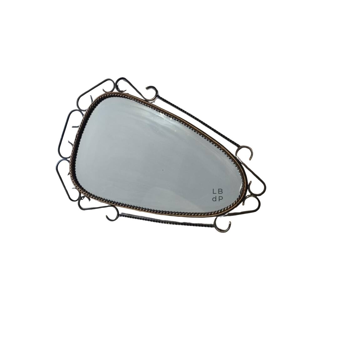 Brutalist antique mirror, sixties era.