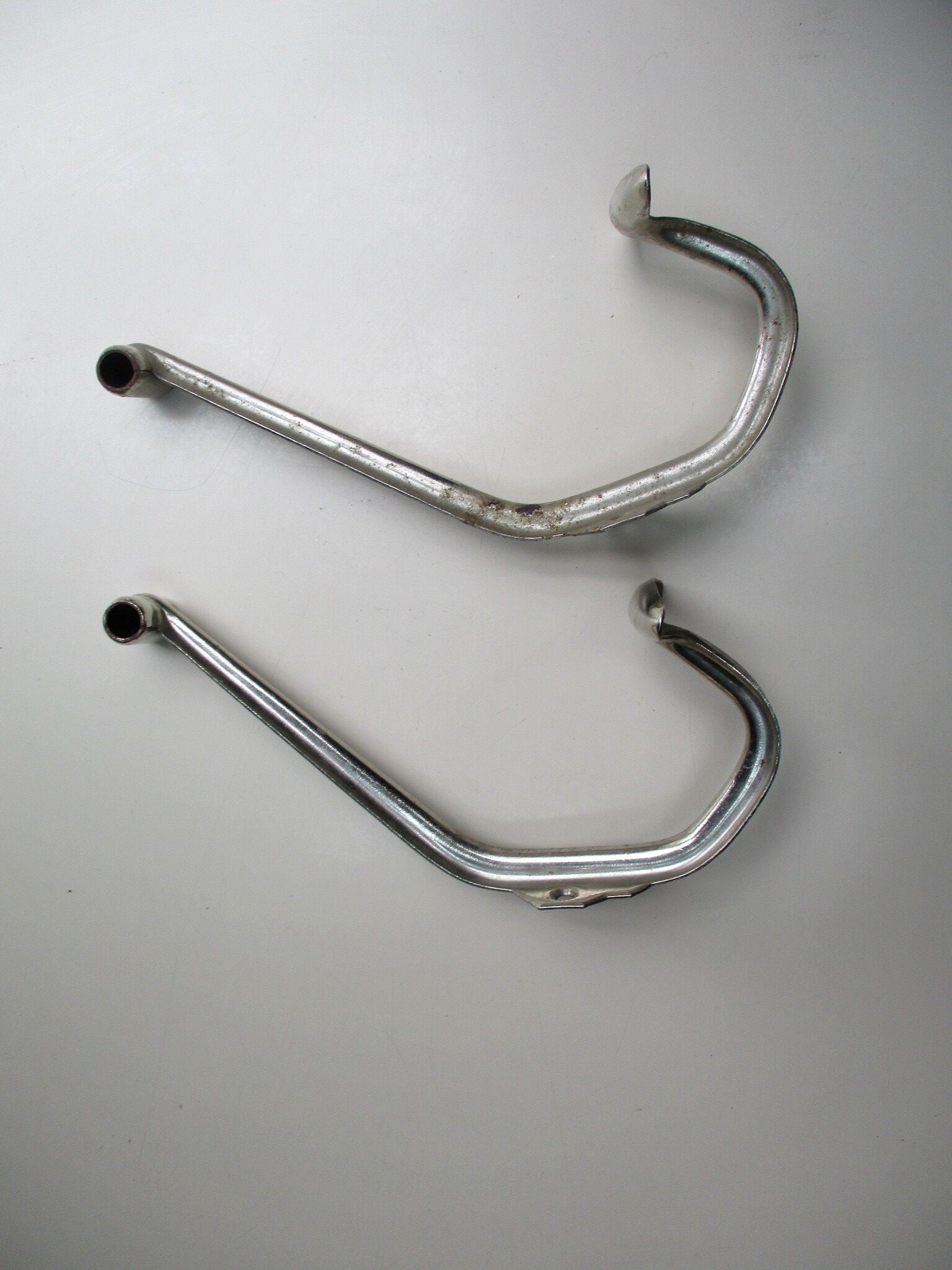 Two industrial iron paters