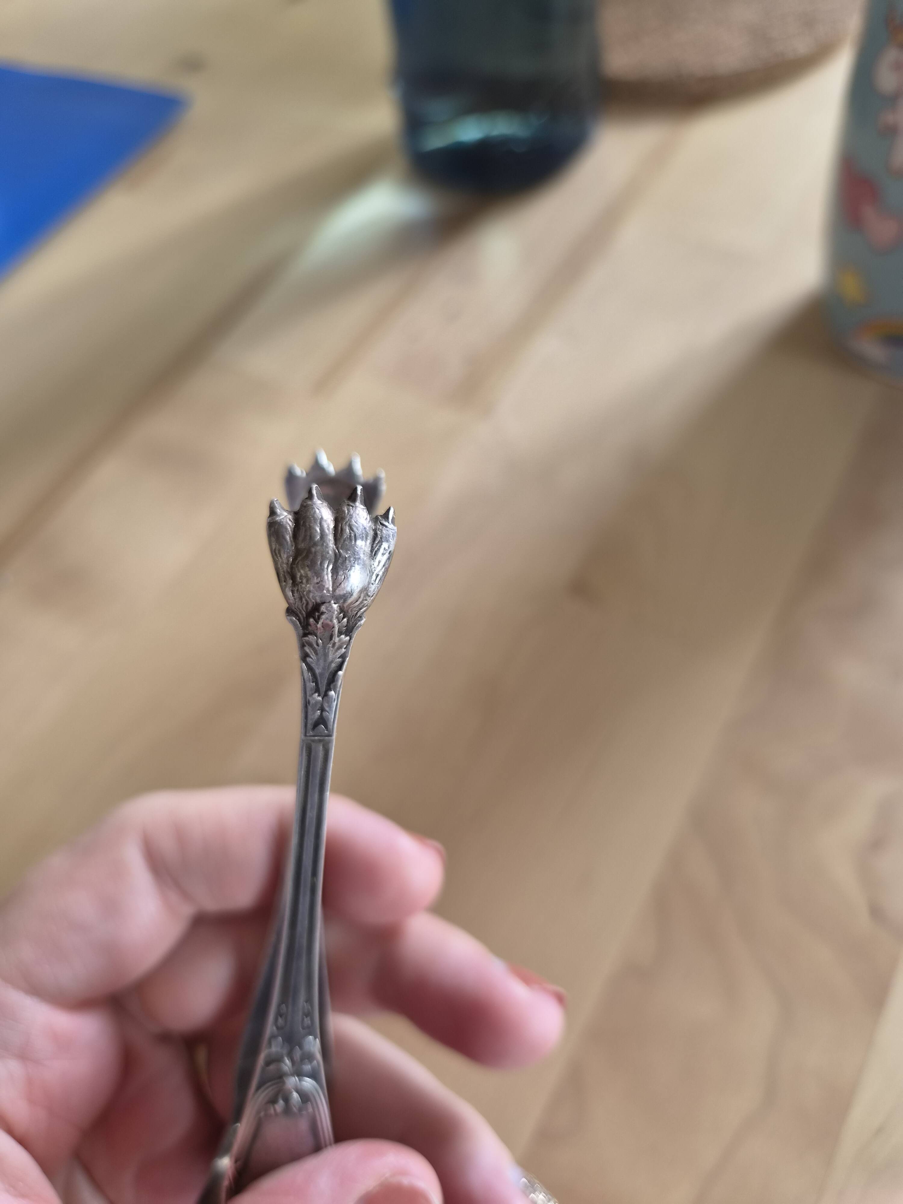 Sugar tongs from the Christofle Art Nouveau house.