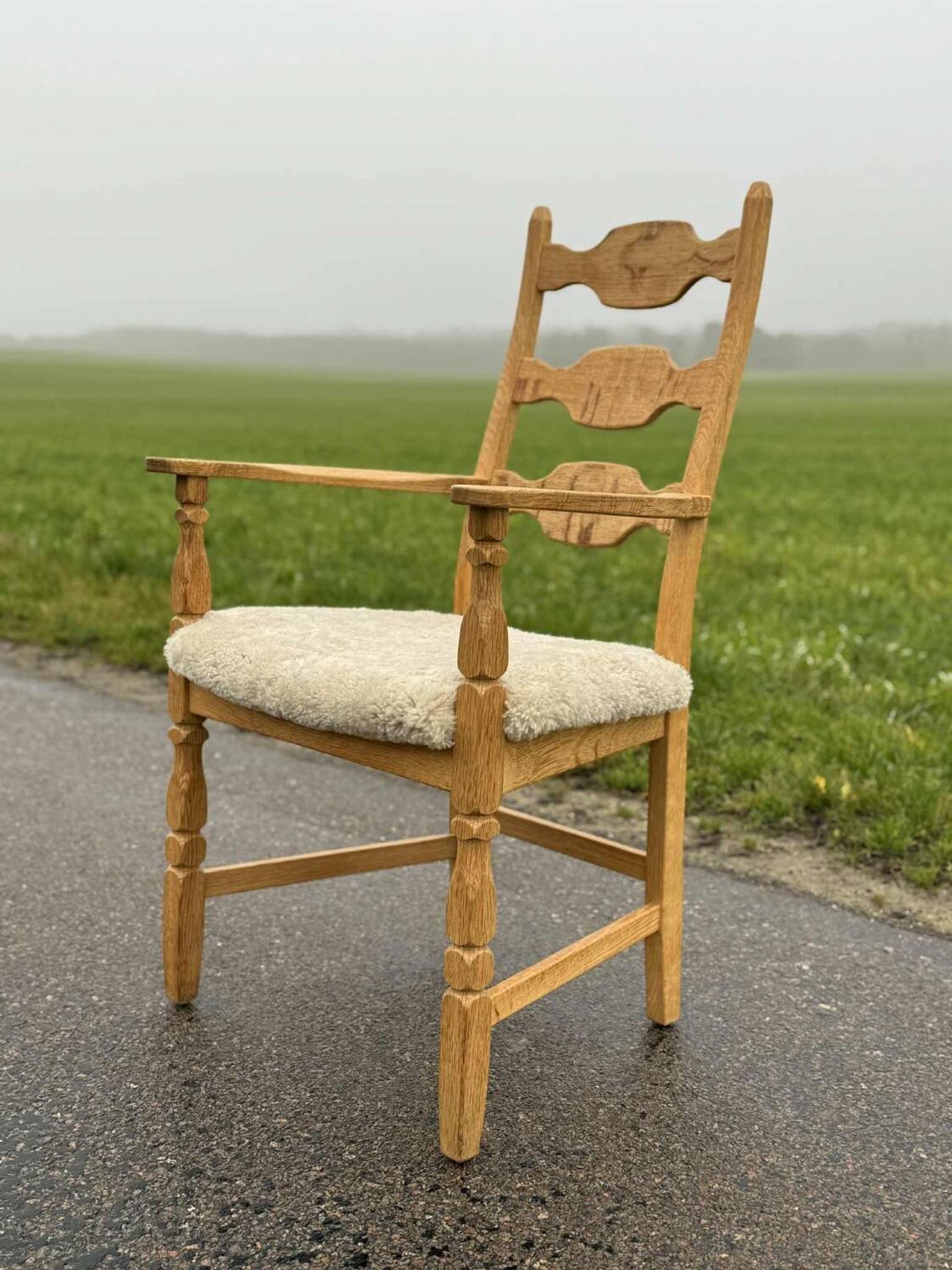 Henning Kjaernulf high back chair with new lambswool