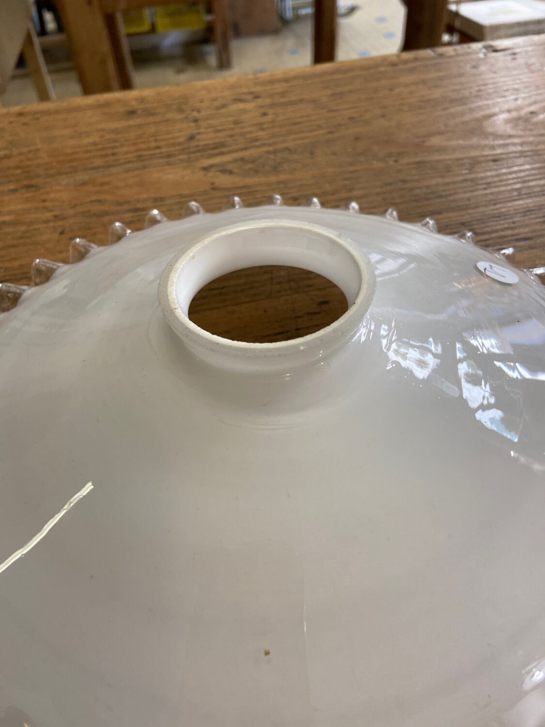 White glass pendant light with ruffled collar