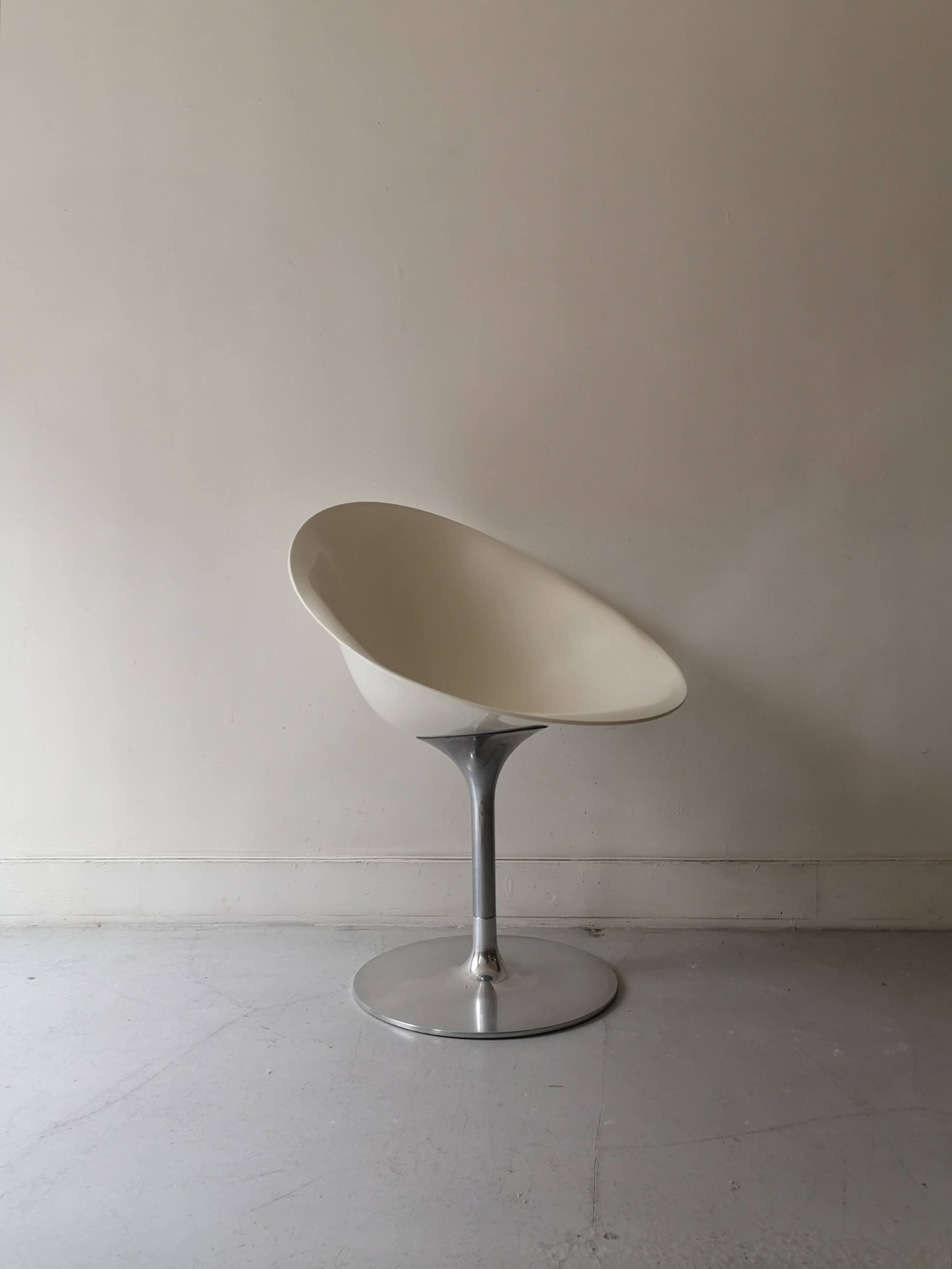 Ero swivel armchair in metal and white shell, p. starck design for kartell