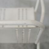 Pair of honeycomb steel armchairs. France, circa 1950.