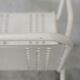 Pair of honeycomb steel armchairs. France, circa 1950.