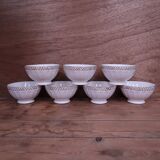 Ancien bol en porcelaine côtelé blanc avec frise dorée