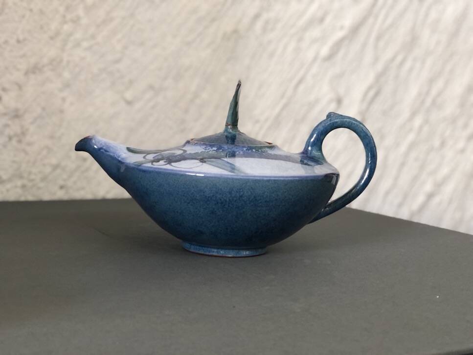 Glazed terracotta teapot