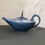 Glazed terracotta teapot