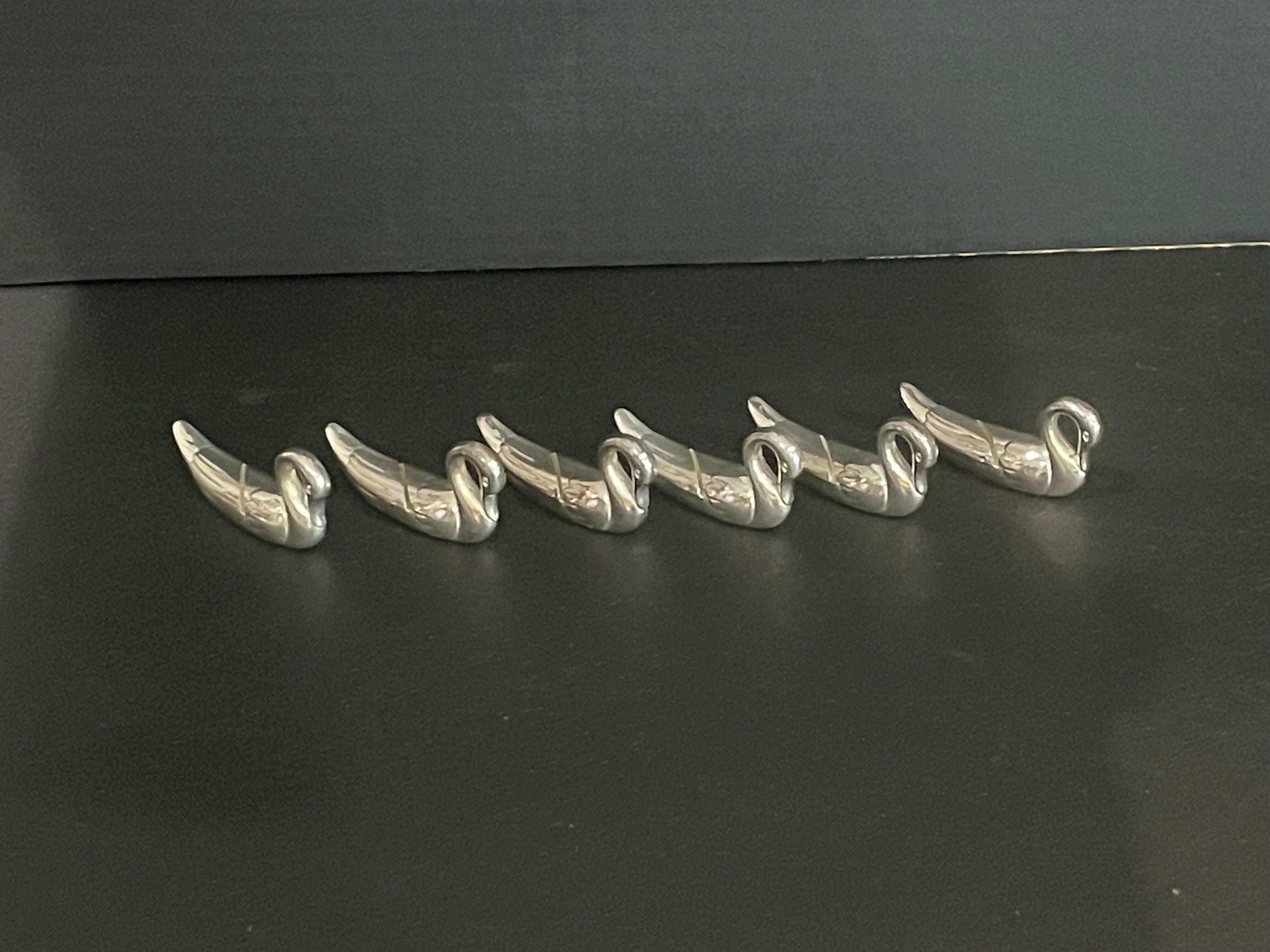 Set of 6 silver metal knife holders for table