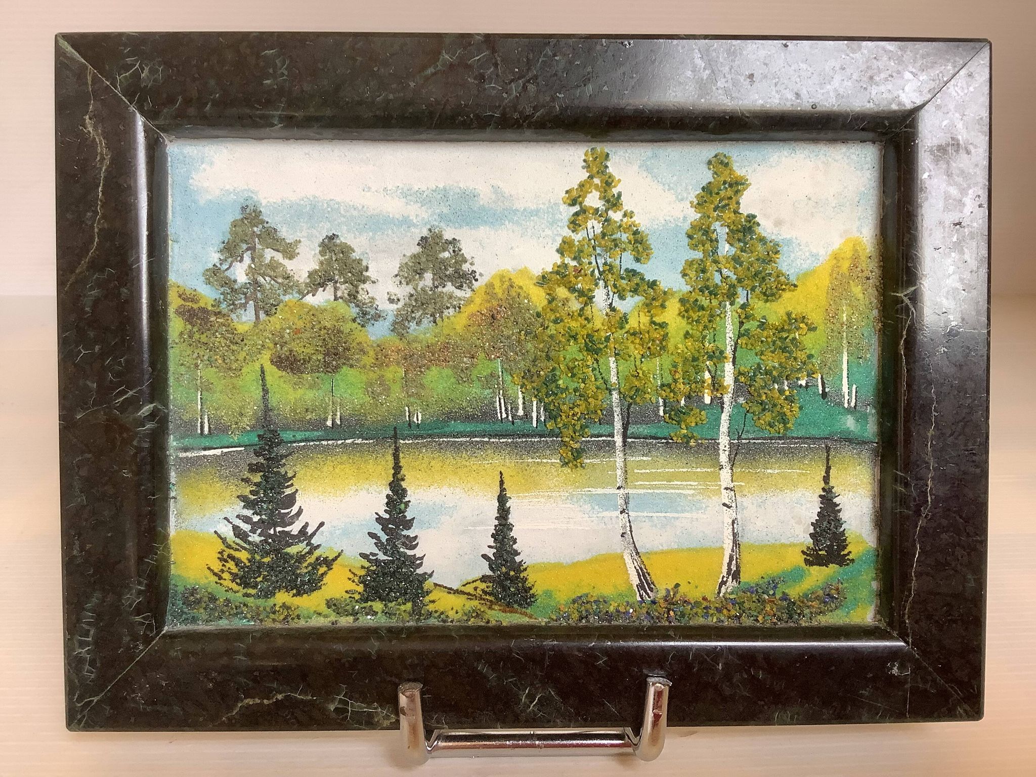 Small landscape painting of a forest in Russian marble.