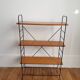 Floor on wooden and metal stand