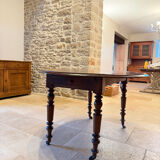 Oval drop-leaf table