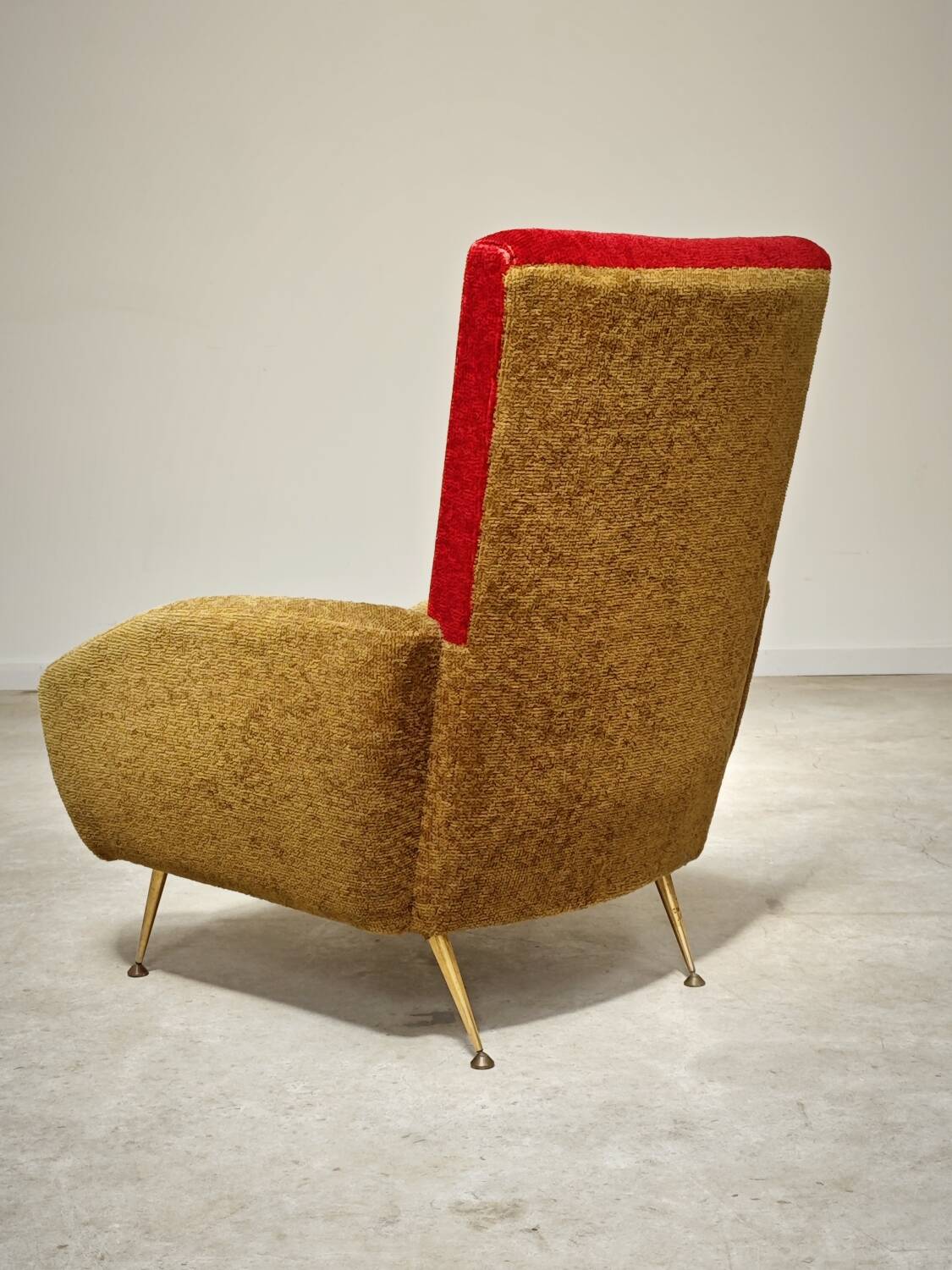 Red and mustard yellow fabric armchair in 1970s style