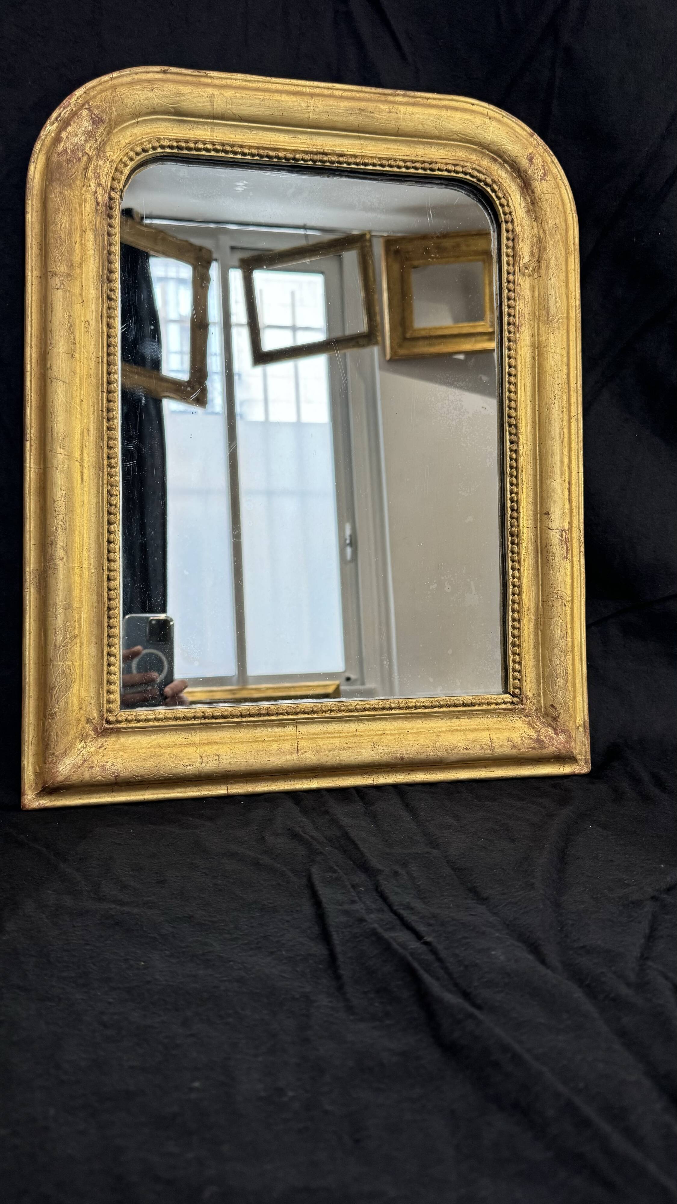 Louis-Philippe mirror gilded with gold leaf