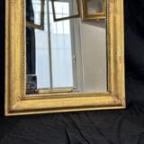 Louis-Philippe mirror gilded with gold leaf