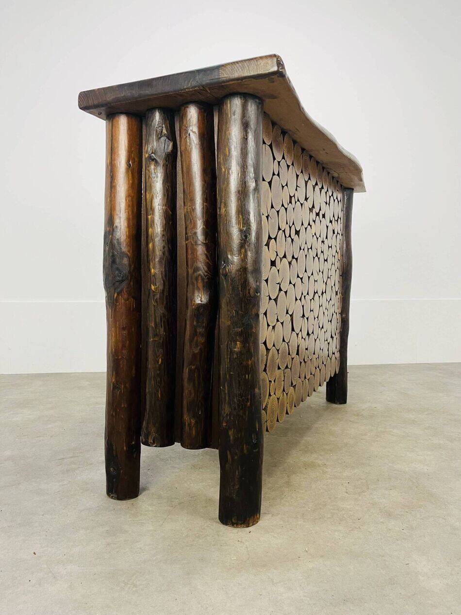 Brutalist bar made of solid wood logs, chalet style, 1970s.