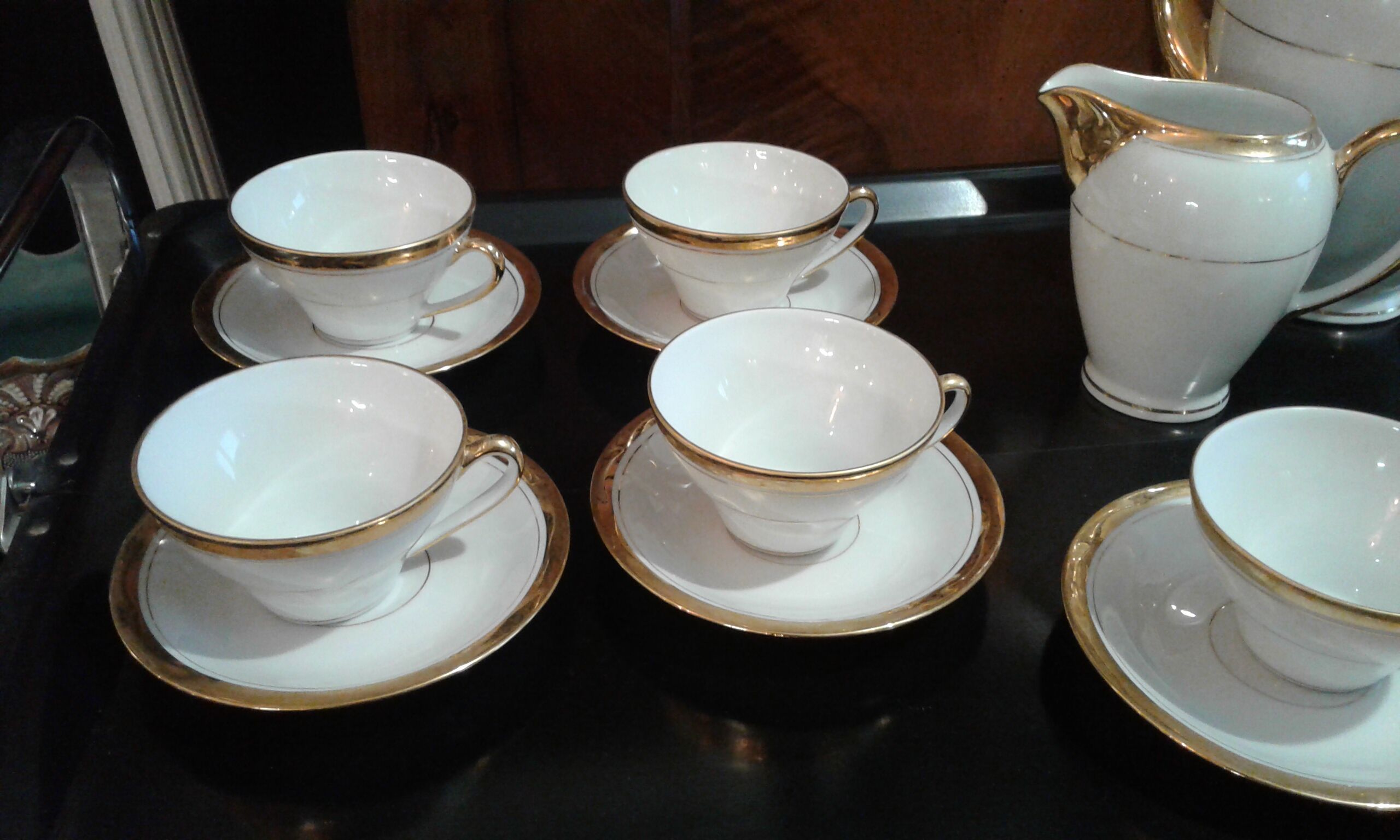 Coffee service. fine porcelain from Limoges. golden
