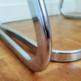2 chrome wired chairs