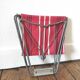 Tabouret pliant en toile rouge à rayure