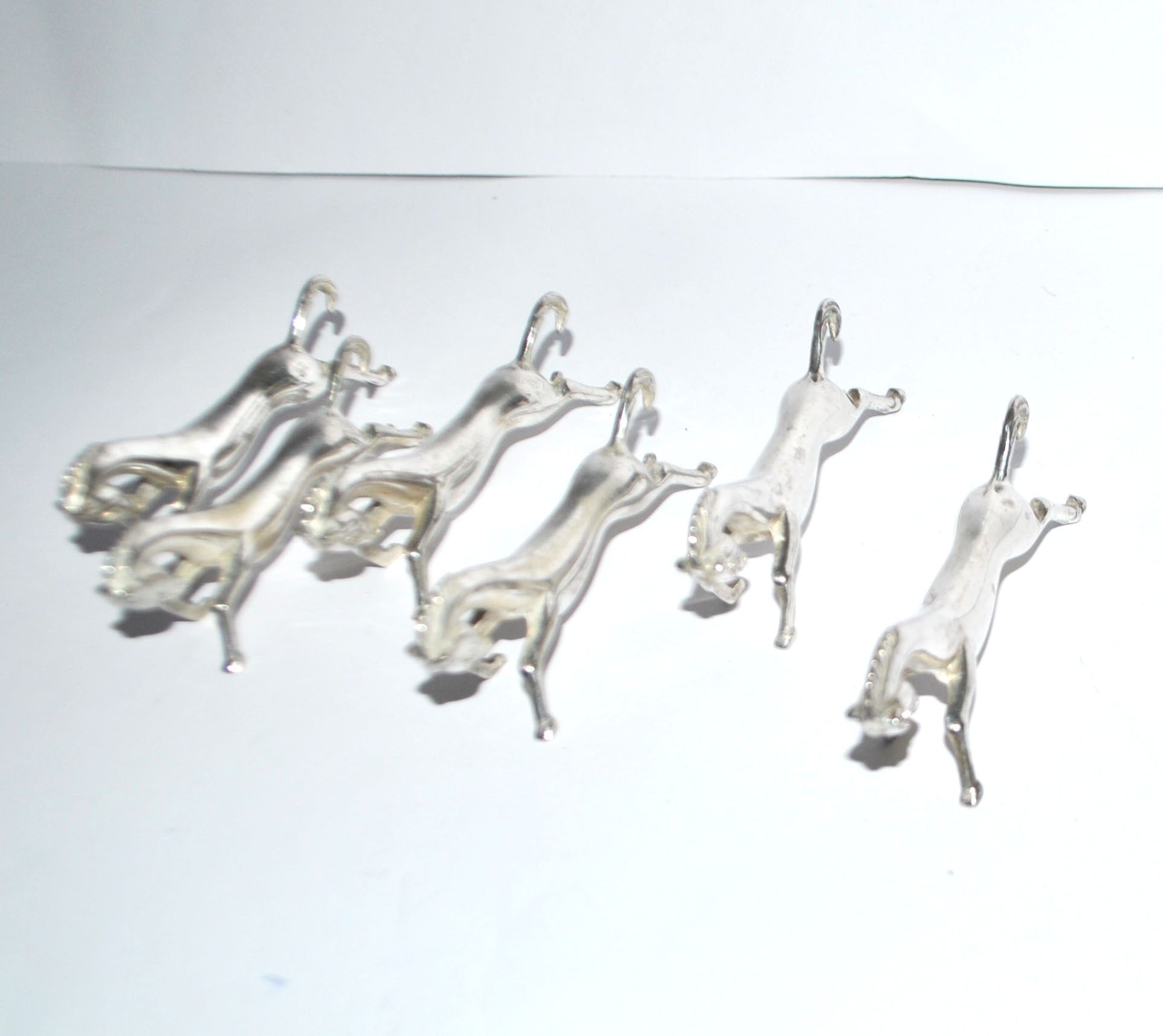 Set of 6 animal-shaped knife rests, modernist horse design in silver-plated metal, equestrian.