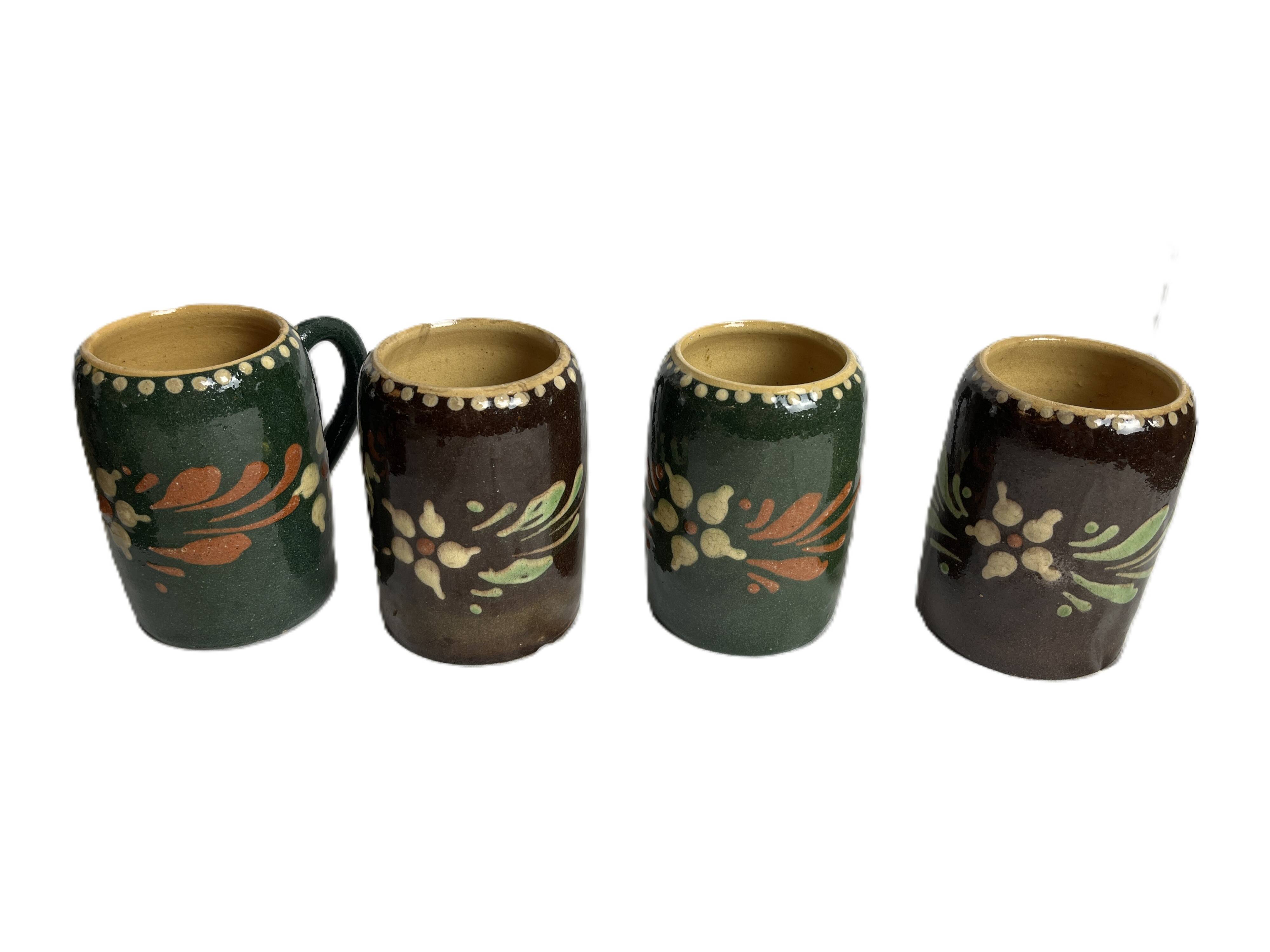 Alsatian pottery, glazed stoneware mug from Soufflenheim, 20th century.