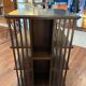 Rotating English library in wood veneer