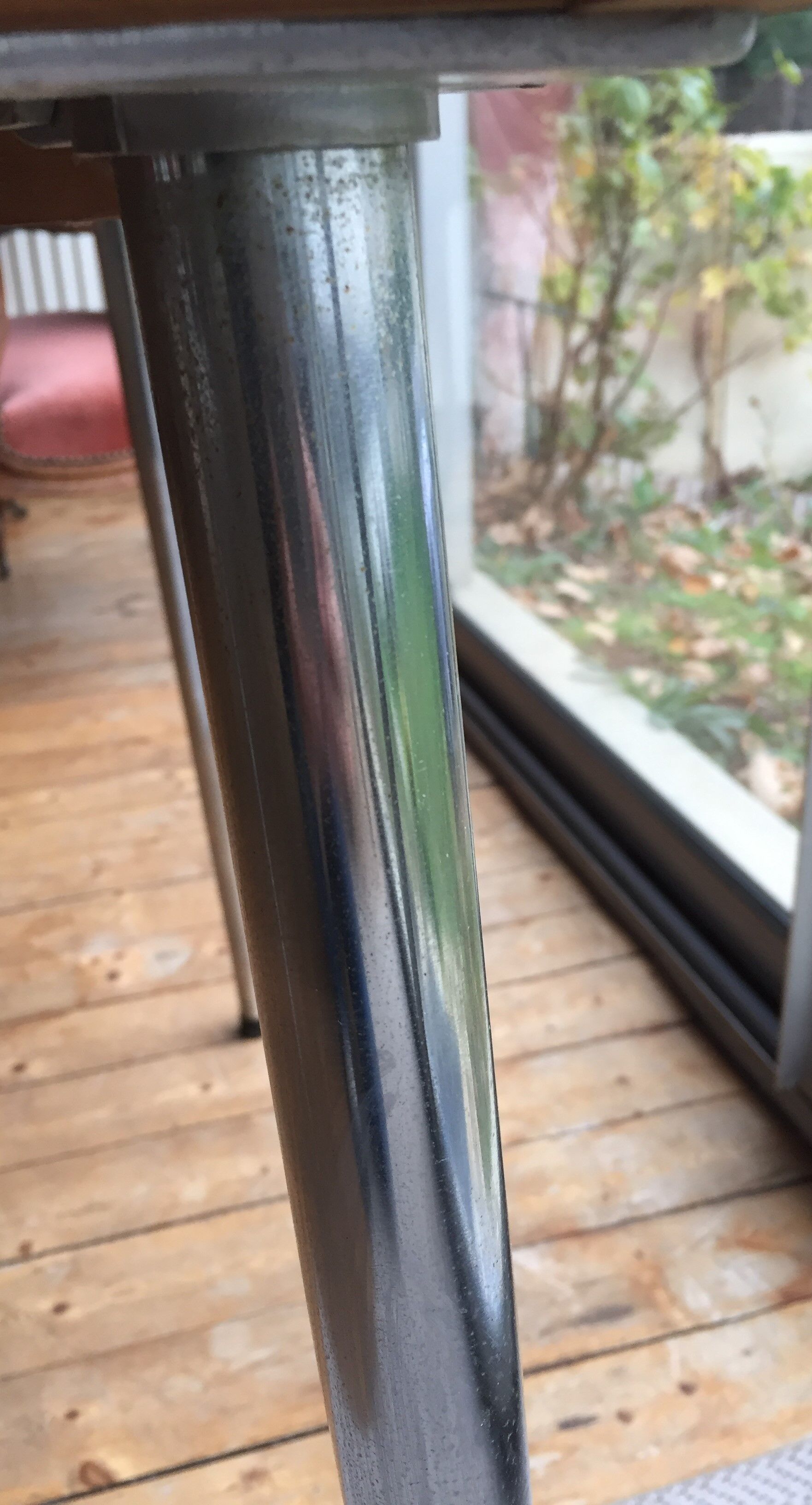 Table set and 2 vintage vintage pale red formica chairs