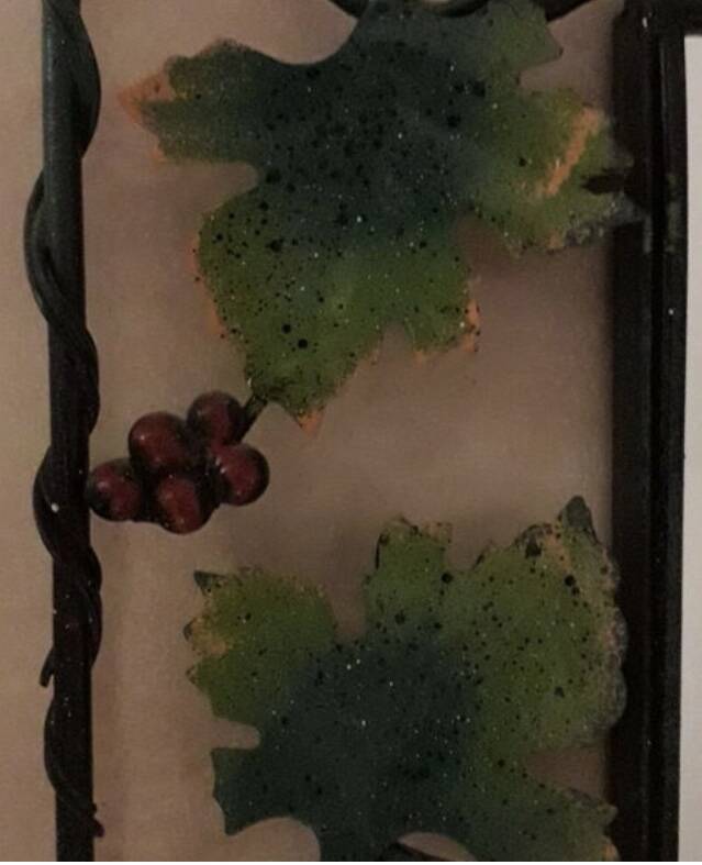 Vintage wrought iron mirror.