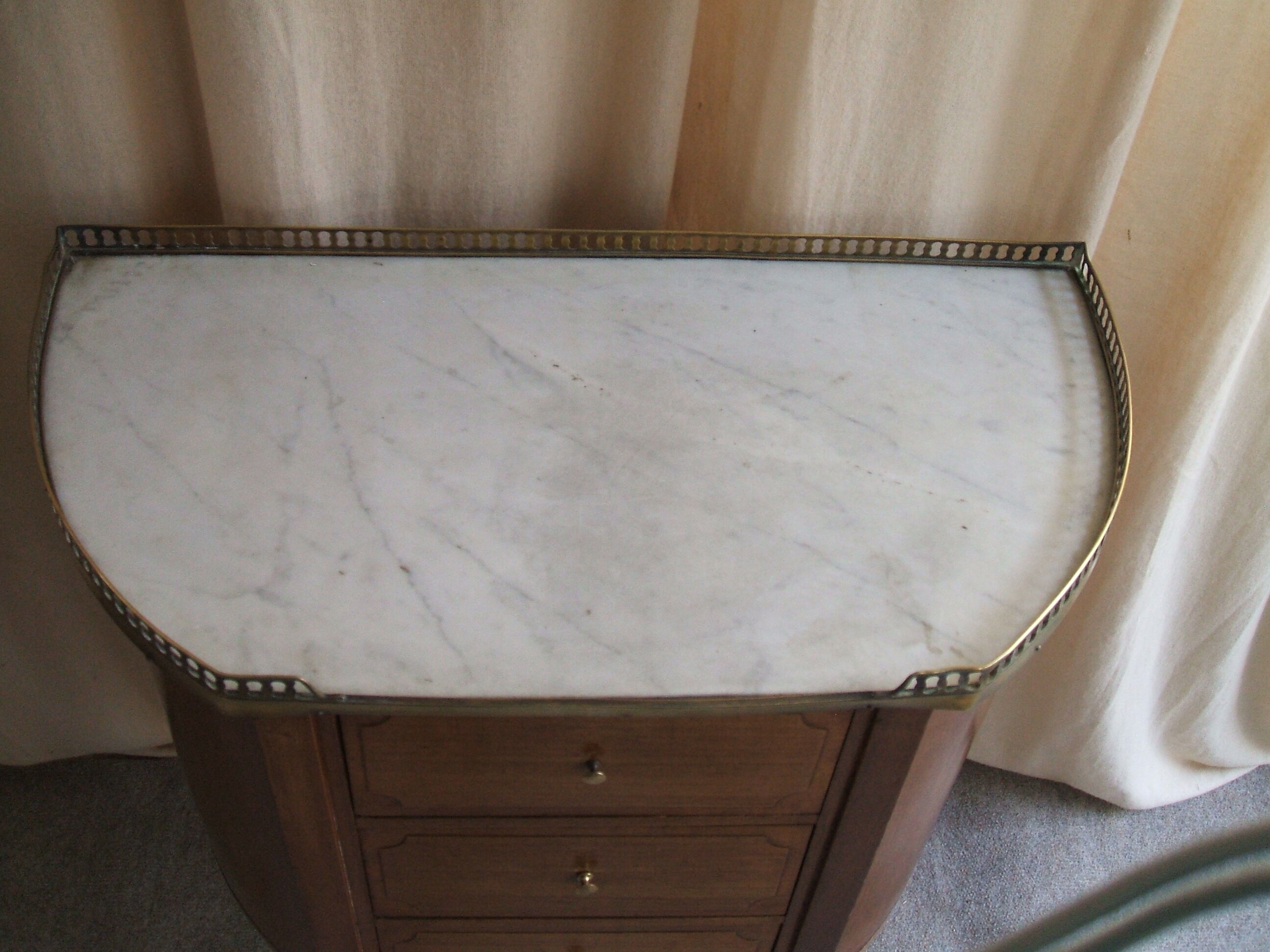 Half moon dresser in Louis XVI style